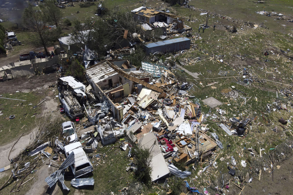Severe storm threats continue after weekend of widespread destruction left at least 22 dead