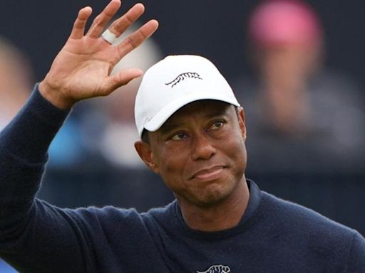 Tiger Woods bows out but refuses to throw in the towel