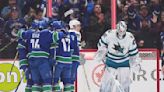 Kuzmenko sets Canucks mark in 7-2 win over Sharks