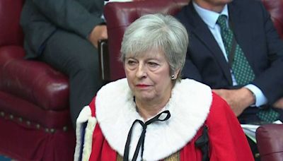 Former prime minister Theresa May takes seat on red benches in Lords