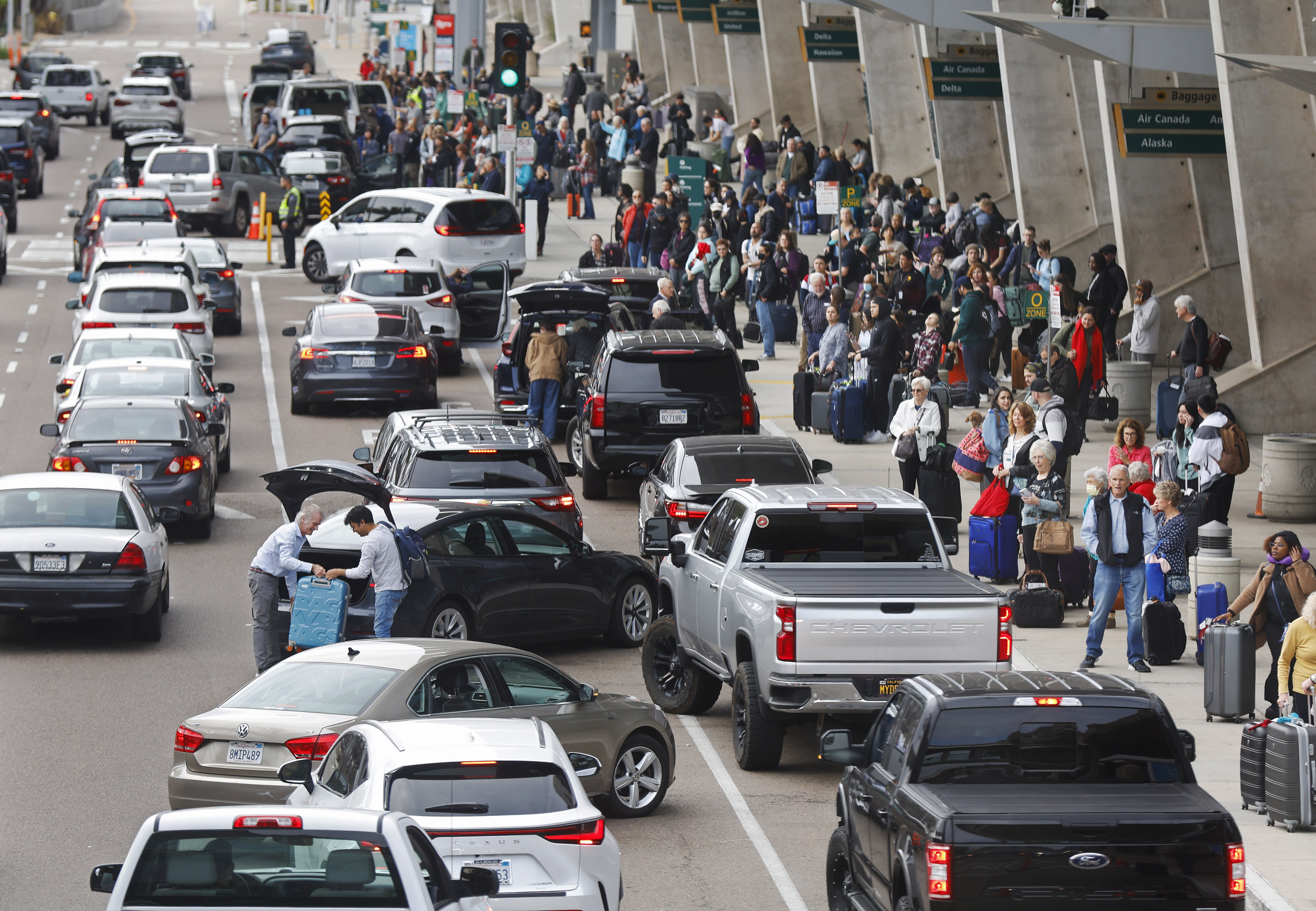 With an airport transit connection still years away, the popularity of a little-known free shuttle is surging through word of mouth