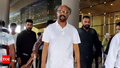 Rajinikanth returns from Abu Dhabi; poses cool with fans at the Chennai airport | Tamil Movie News - Times of India