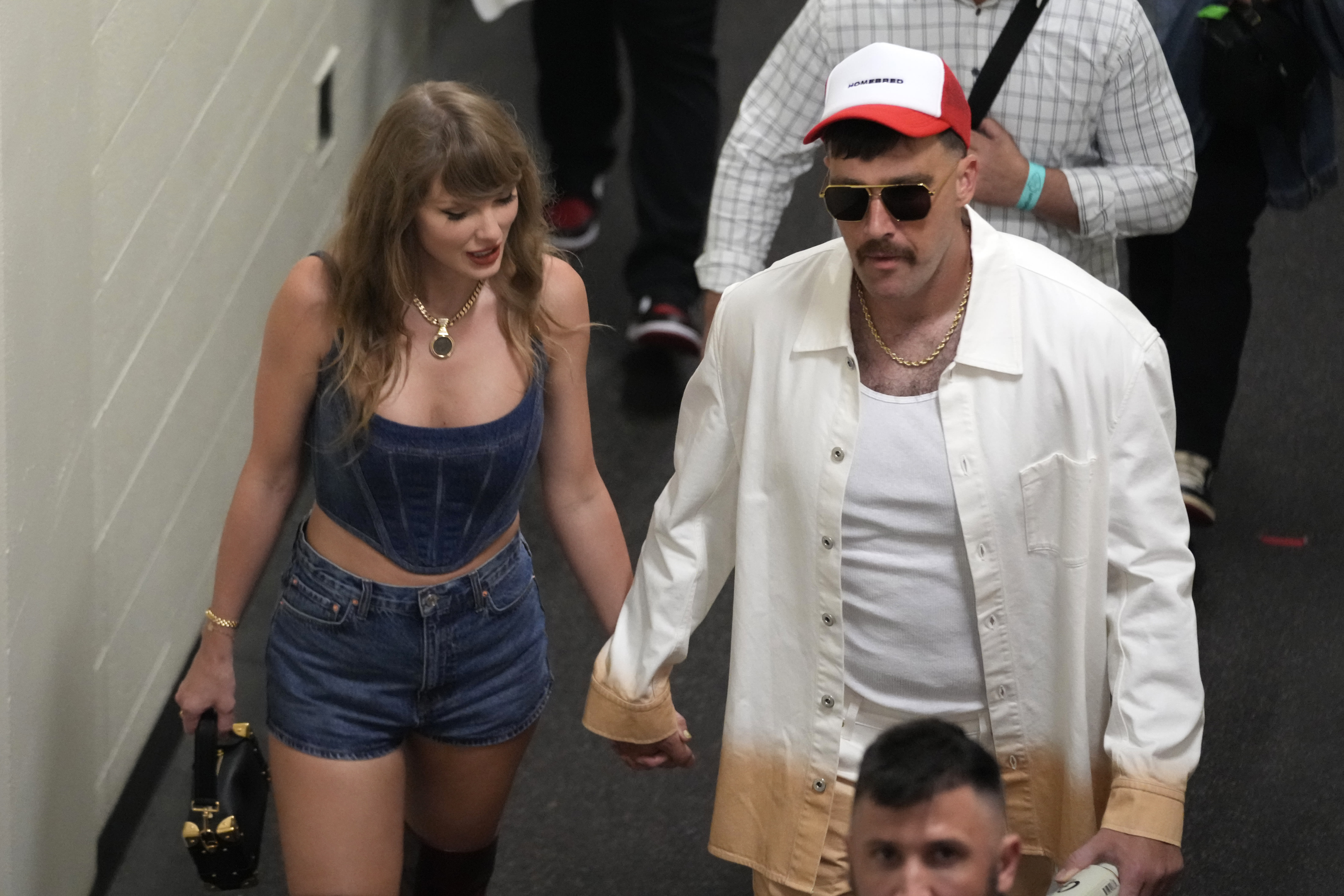 Taylor Swift has never 'had a man who has even been so openly proud to be with her' like Travis Kelce is, author says