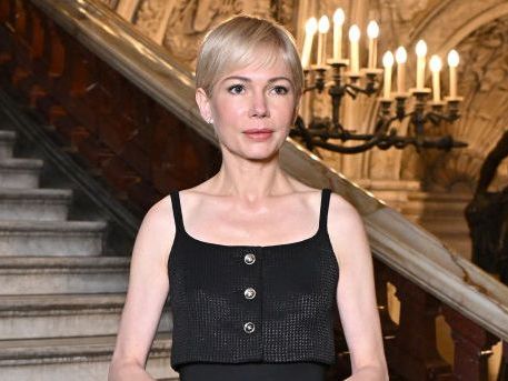 Michelle Williams embodies classic Parisian glamour with chic summer midi