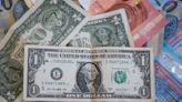 Dollar eases, yen finds floor from Tokyo's jawboning