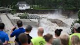 Part of a Minnesota home has plunged into a river as deadly flooding threatens the nearby Rapidan Dam