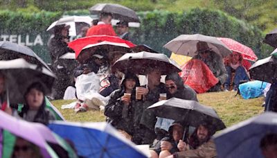 UK weather: Wimbledon and Grand Prix face disruption as weekend of heavy rain continues