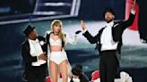 Taylor Swift’s boyfriend Travis Kelce performs with her on stage during London Eras concert; Tom Cruise dances in the crowd. Watch