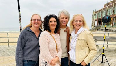 Jon Bon Jovi, and his guitar, make a surprise appearance on the Asbury Park boardwalk