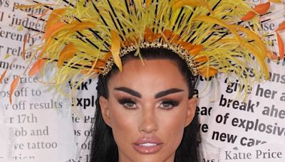 Katie Price sings and turns heads in eye-catching look at photo call for new memoir – after bombshell baby news