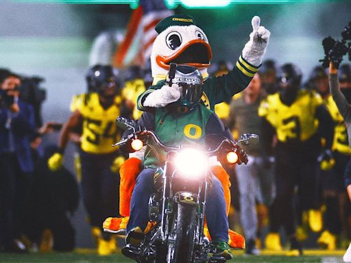 Here come the Ducks! Large inflatable of Oregon's mascot placed in Indy river