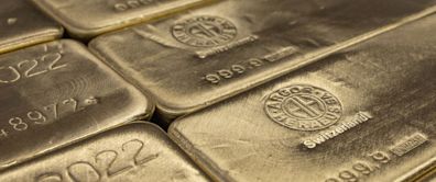 Gold holds ground as Fed keeps rates steady