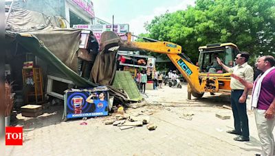 GMDA clears 50 illegal structures on service roads and greenbelt in Gurgaon | Gurgaon News - Times of India