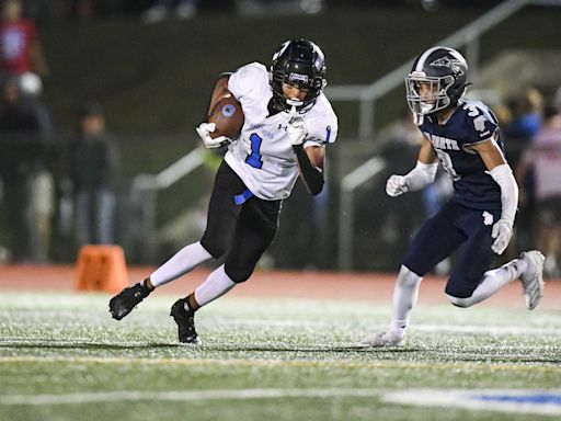 Quakertown wins again, tops CR North in football; Thomas continues to excel