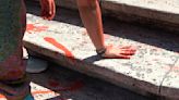 Activists pour red paint down Rome’s famed Spanish Steps in outrage over femicides in Italy