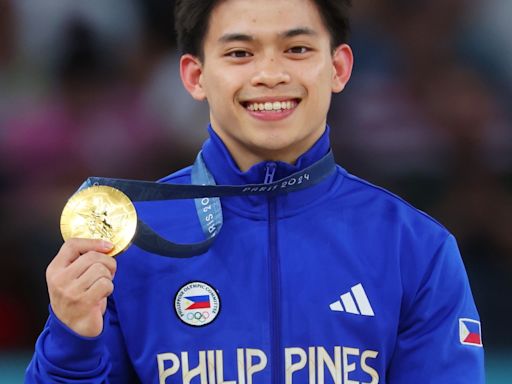 2024 Olympics: Gymnast Carlos Yulo Wins Condo, Colonoscopies and Free Ramen for Life After Gold Medal - E! Online