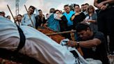 'I need to ask God why.' In Israel and Gaza, the scale of death overwhelms the living