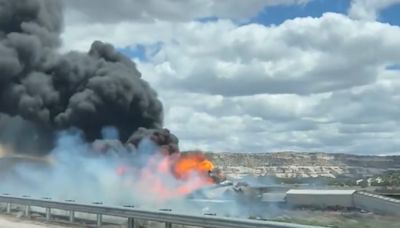 Freight train derailment, fire forces Interstate 40 closure near Arizona-New Mexico line