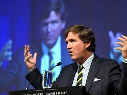 Tucker Carlson fumes at Australian reporter's 'absurd soliloquy' after he calls him Putin's ‘useful idiot’