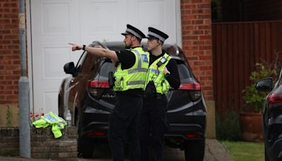 Three women dead with fears murder suspect is armed with a crossbow as police surround street