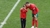 Portugal coach bemoans risk to player safety as pitch invaders chase Ronaldo selfies
