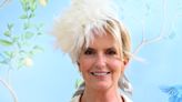 Penny Lancaster amazes in leg-lengthening mini dress and feathered fascinator