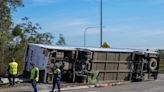 Driver charged after bus carrying wedding guests flips in Australia, killing 10 and injuring 25