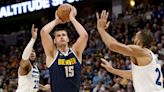 Nuggets claw Wolves to reclaim top spot