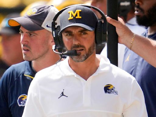 From a national title at Michigan to coaching together in LA, a special Father's Day for the Minters