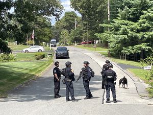 Search ongoing for man accused of pointing gun at mail carrier, ditching car in Tewksbury