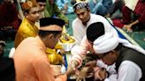 Heed time-honoured customs or economise? In Malaysia, bridal couples feel the pain of wedding sticker shock