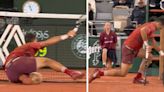 Djokovic booed after falling on court at tense moment in rowdy French Open match