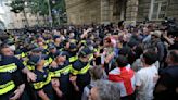 Georgian lawmakers move closer to passing 'Russian law' targeting the media. Protesters gather again