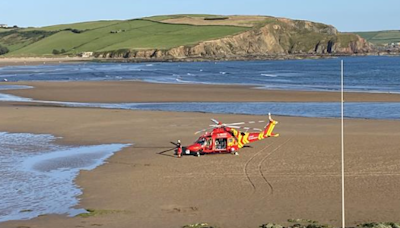 Beach evacuated as injured person airlifted