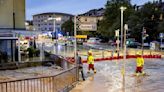 Swiss inspect the damage after sudden storms flood roads, halt air traffic in Geneva