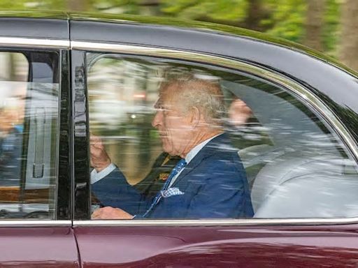 King Charles keeps up the pace as he is driven from Clarence House on public duty after Queen Camilla joked she had been 'trying to hold him back' during cancer treatment