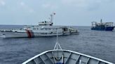 China's forces shadow a Philippine navy ship near disputed shoal, sparking new exchange of warnings