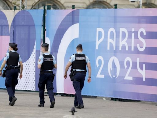 Central Paris locks down for Olympics as athletes arrive