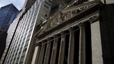 Wall Street ends lower as Fed worries outweigh earnings