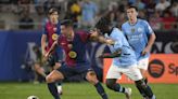 Flick opens his Barcelona tenure with win over Manchester City