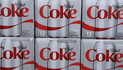 Shoppers rush to buy Diet Coke scanning at supermarket for only 13p per can