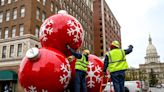 Lansing's big, red Christmas ornaments are back at downtown roundabout