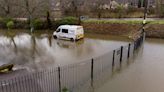 Roads submerged amid flood warnings across parts of UK