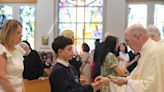 Blessings and prayers: S.I. Catholic schools celebrate graduating 8th-graders at annual mass