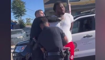 Los Angeles police officer brutally punches handcuffed man in face