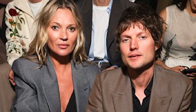 Kate Moss breaks her usual front row poise at Dior show in Paris