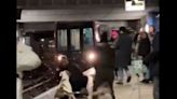Dog nearly drags man in front of train in savage attack at station