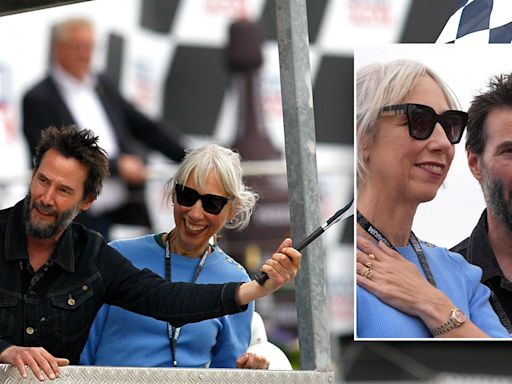 Keanu Reeves and girlfriend Alexandra Grant make rare joint appearance at motorcycle race in Germany