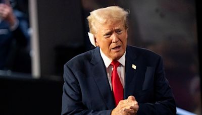 Trump enters GOP convention wearing bandage over ear