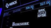 Berkshire pares huge Apple stake as cash, operating profit set records